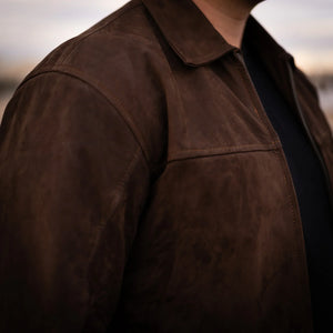 High-resolution detail of soft Nubuck surface on Valle leather jacket.