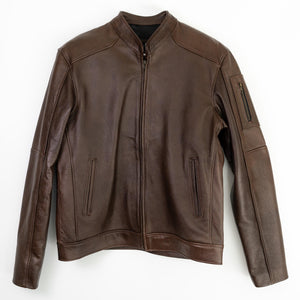 Luxury Sierra leather jacket displayed in studio setting.